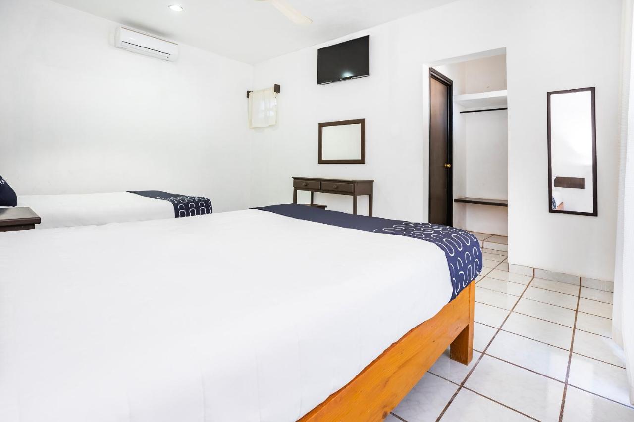 Hotel Capital O Oxtankah,Chetumal Bay Calderitas Exterior foto